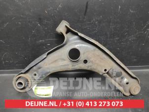 Toyota Yaris Querlenker unten links vorne O725722 foto 2