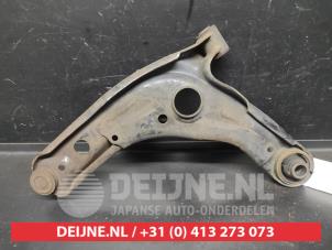 Toyota Yaris Querlenker unten rechts vorne O725723 foto 2