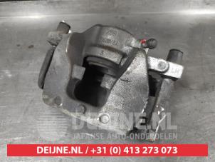 Nissan Qashqai Front brake calliper, left O726591 photo 2