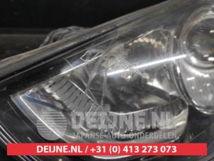 Hyundai IX35 Koplamp links O726697 foto 3