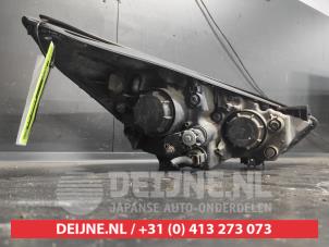 Hyundai IX35 Koplamp links O726697 foto 2
