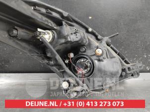 Suzuki Swift Scheinwerfer links O727343 foto 2