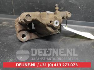 Nissan Qashqai Rear brake calliper, left O728319 photo 2