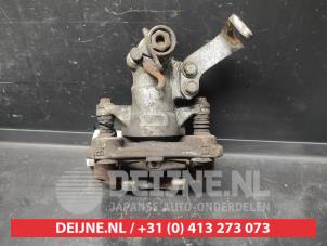 Suzuki Swift Rear brake calliper, left O728621 photo 3