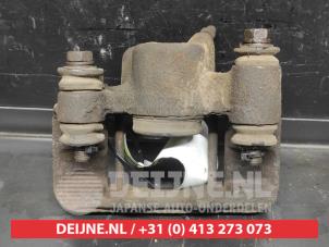Toyota Celica Rear brake calliper, right O728754 photo 2
