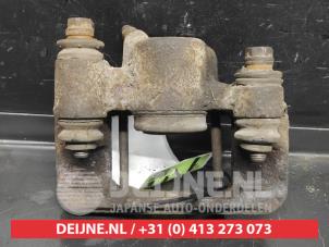 Toyota Celica Rear brake calliper, left O728755 photo 2