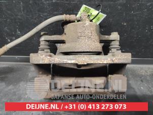 Toyota Urban Cruiser Front brake calliper, left O728909 photo 2