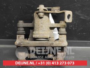 Kia Rio Remklauw (Tang) links-achter O728941 foto 2