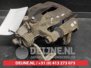 Kia Rio Remklauw (Tang) links-achter O728941 foto 3