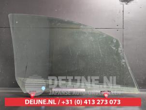 Toyota Yaris Türscheibe 4-türig links vorne O728956 foto 2