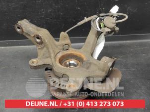 Suzuki Celerio Fusee rechts-voor O729014 foto 2
