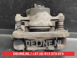 Nissan Pixo Bremszange links vorne O729144 foto 3