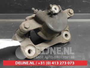 Nissan Pixo Bremszange links vorne O729144 foto 2
