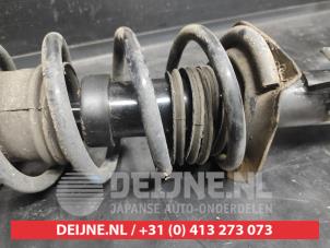 Nissan Micra Stoßdämpferstrebe links vorne O730320 foto 2