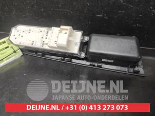 Toyota Yaris Multi-functional window switch O730405 photo 2