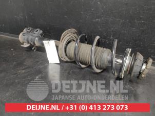 Suzuki Swift Schokdemperpoot rechts-voor O730580 foto 3