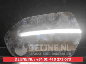 Toyota Yaris Mirror glass, left O731571 photo 2