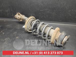 Suzuki Swift Schokdemperpoot rechts-voor O731671 foto 2