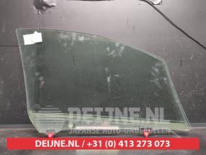 Toyota Yaris Türscheibe 4-türig links vorne O732022 foto 2