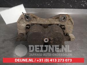 Ssang Yong Rexton Bremszange links vorne O732429 foto 2