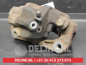 Daihatsu Terios Bremszange links vorne O732625 foto 2