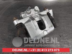 Mitsubishi Lancer Remklauw (Tang) links-achter O732712 foto 2