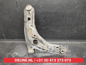 Toyota Yaris Front lower wishbone, left O732846 photo 2