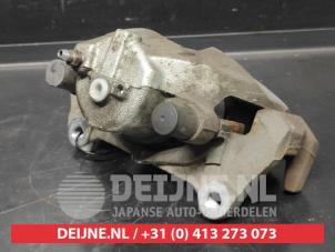 Toyota Yaris Front brake calliper, left O733139 photo 2