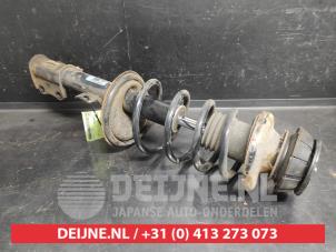 Suzuki Swift Front shock absorber rod, left O733619 photo 2