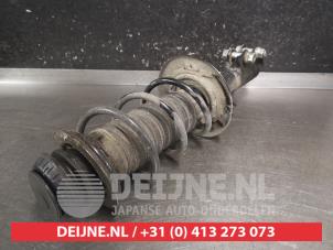 Mazda 2 Hybrid Schokdemperpoot links-voor O733653 foto 2