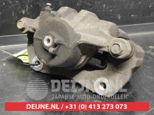 Hyundai IX20 Bremszange links vorne O733852 foto 2