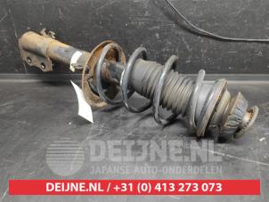 Toyota Yaris Front shock absorber rod, left O734810 photo 2