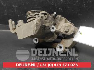 Suzuki Swift Rear brake calliper, right O734899 photo 2