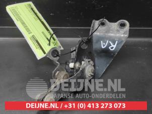 Suzuki Swift Xenon hoogteregelaar O734905 foto 3