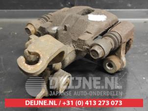 Hyundai I10 Rear brake calliper, left O734951 photo 2