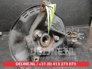 Toyota Yaris Achsschenkel links vorne O735046 foto 2