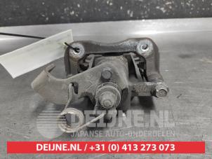 Kia Rio Rear brake calliper, right O735370 photo 2