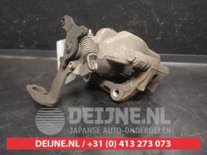 Toyota Avensis Rear brake calliper, right O735427 photo 2