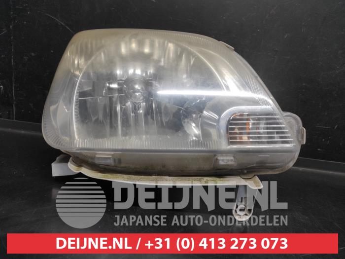 Daihatsu Cuore Headlight, right O735512