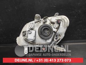 Daihatsu Cuore Koplamp rechts O735512 foto 3