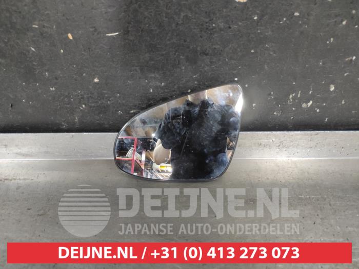 Toyota Aygo X Mirror glass, left O735510
