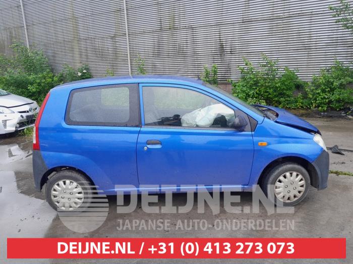 Daihatsu Cuore Türscheibe 2-türig rechts O735528