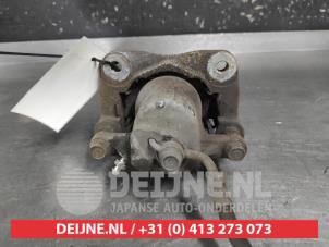 Toyota Rav-4 Bremszange links hinten O735692 foto 2