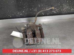 Toyota Rav-4 Bremszange links hinten O735692 foto 3