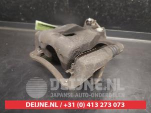 Hyundai I10 Bremszange links hinten O736097 foto 3