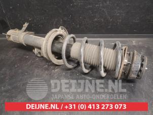 Kia Picanto Schokdemperpoot links-voor O736200 foto 2