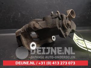 Kia Rio Remklauw (Tang) links-achter O736305 foto 2