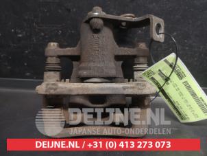 Kia Rio Remklauw (Tang) links-achter O736305 foto 3