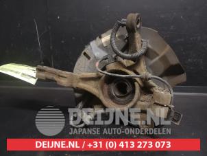 Kia Rio Achsschenkel rechts vorne O736307 foto 2