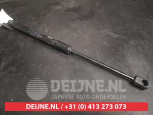 Toyota Aygo X Rear gas strut, left O736477 photo 2
